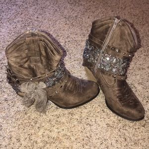 Deep brown stylish heeled booties.